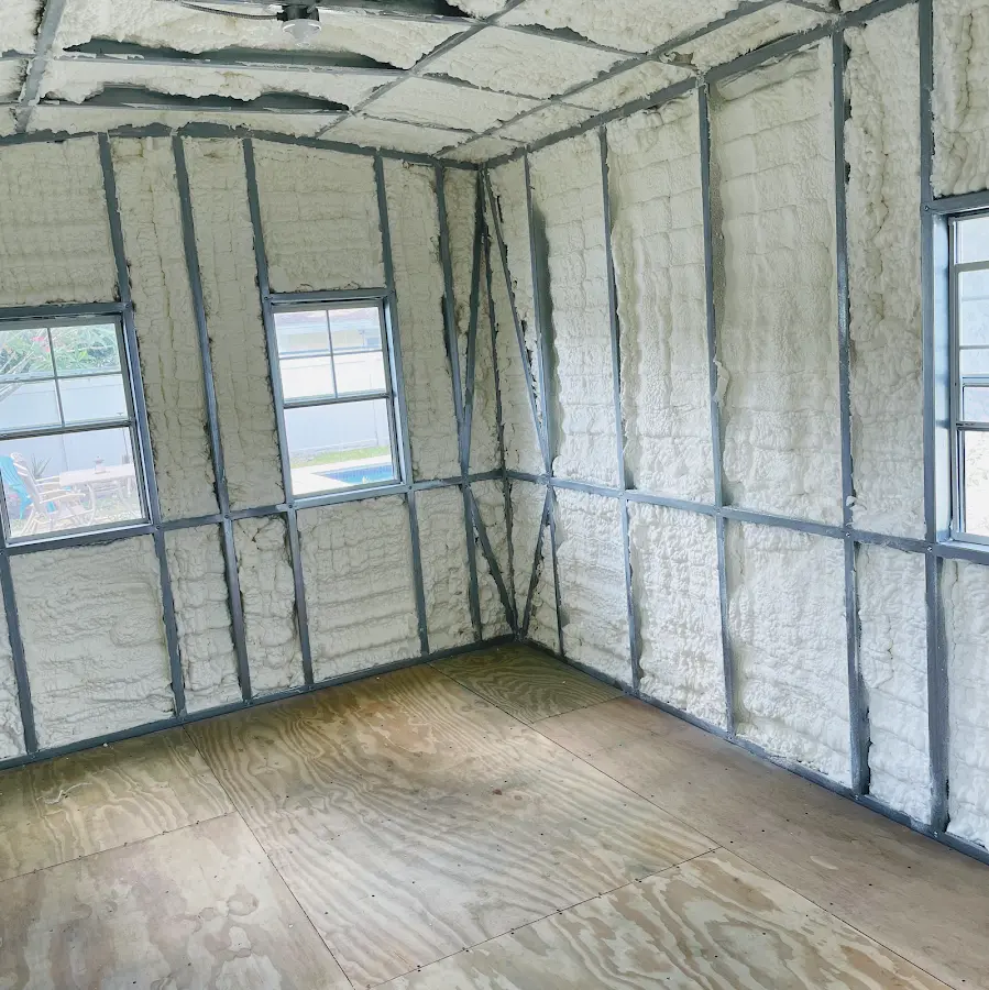 Closed-cell spray foam insulation applied to wall cavities in a residential project in Waikele
